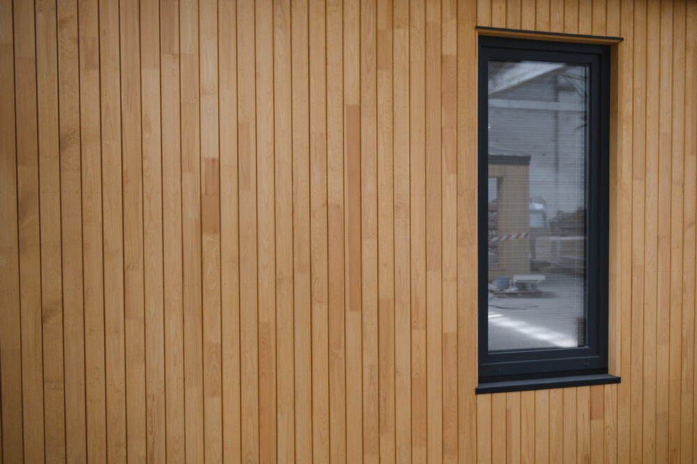 Eurowood aluminium weatherboard cladding installed on a home exterior beside a window